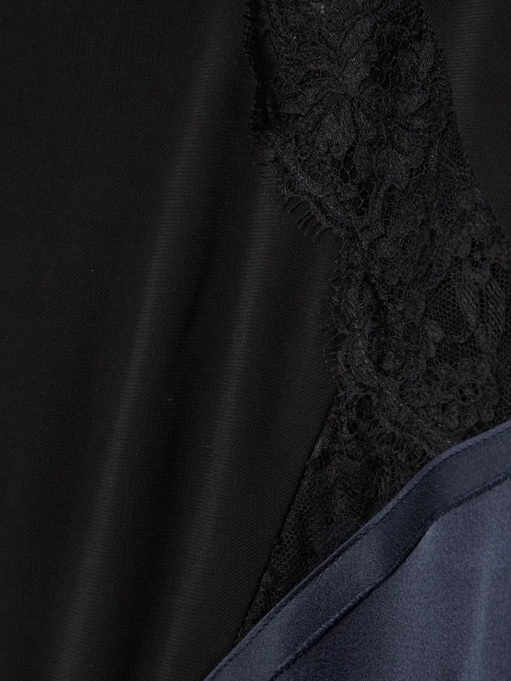 Close-up detail of the Victoria Beckham Lace-trimmed Crepe and Satin-crepe Gown