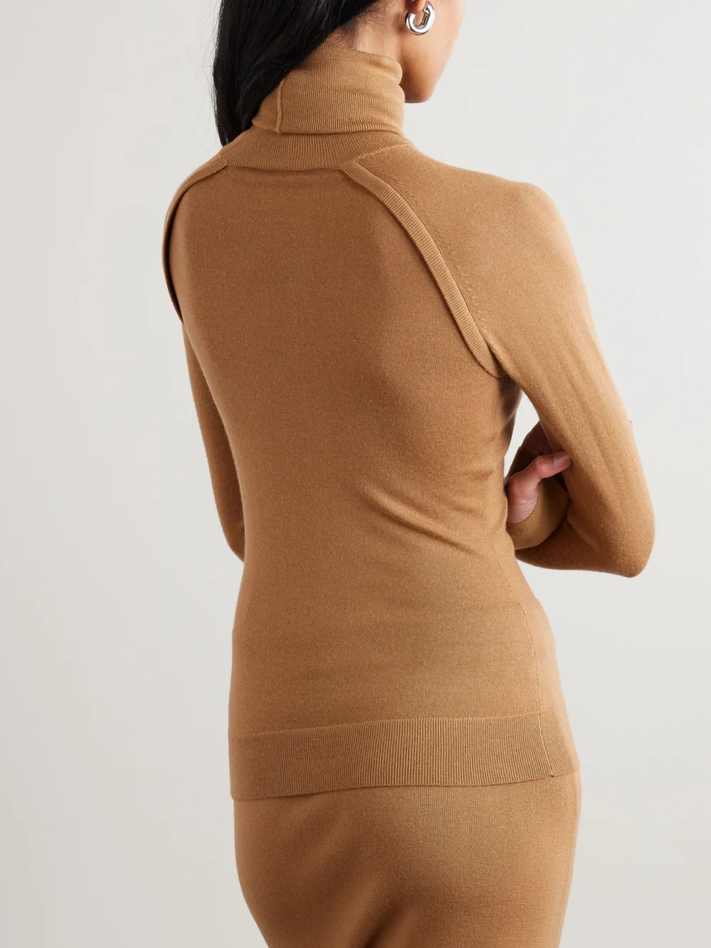 Back view of the Victoria Beckham Layered Merino Wool Turtleneck Top