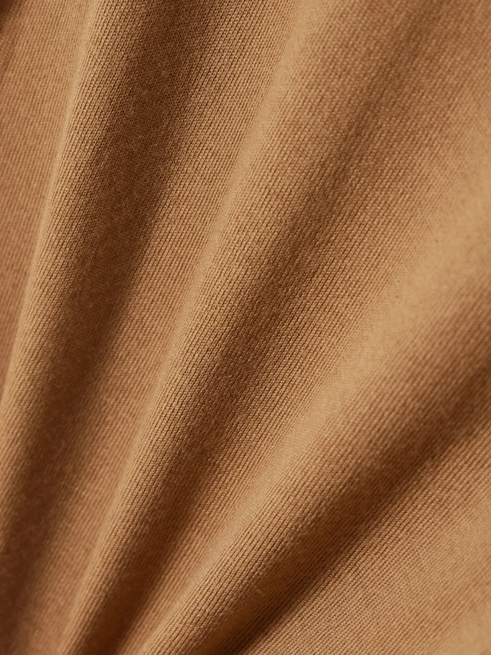 Close-up detail of the Victoria Beckham Layered Merino Wool Turtleneck Top
