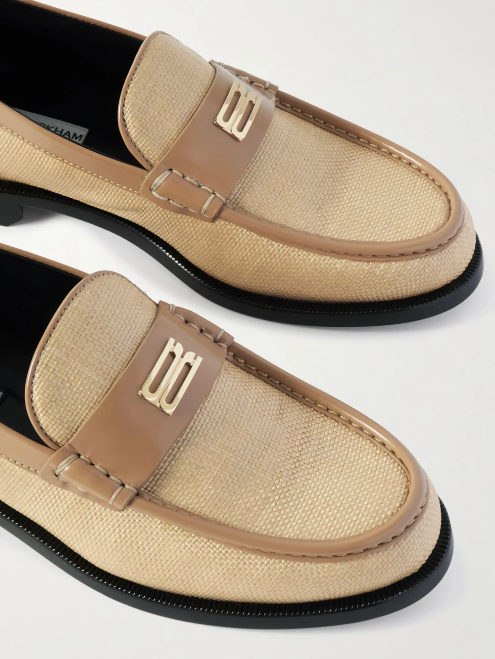 Close-up detail of the Victoria Beckham Leather-trimmed Raffia Loafers