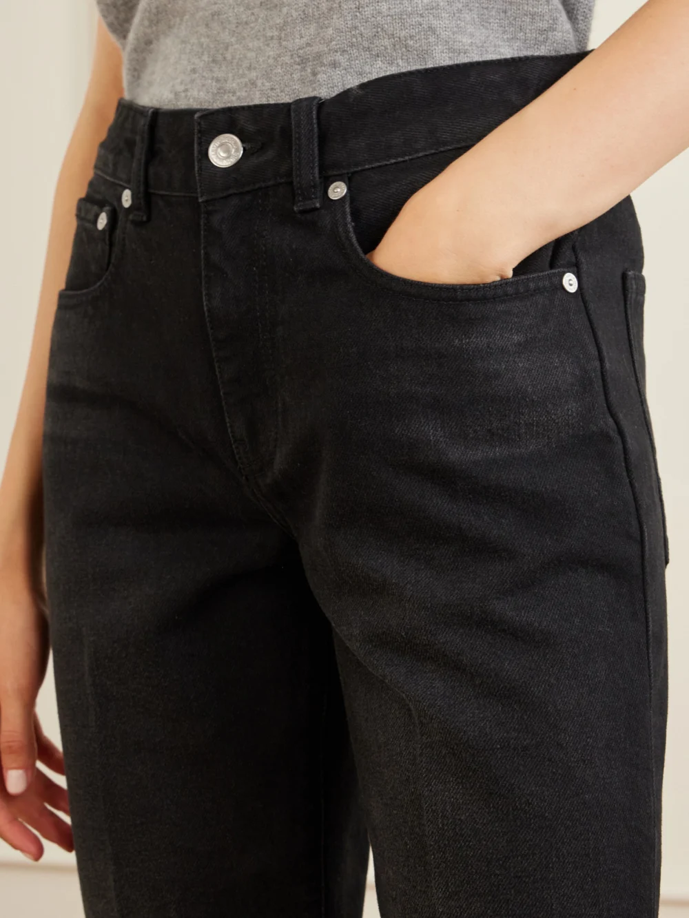 Close-up detail of the Victoria Beckham Low-rise Straight-leg Jeans
