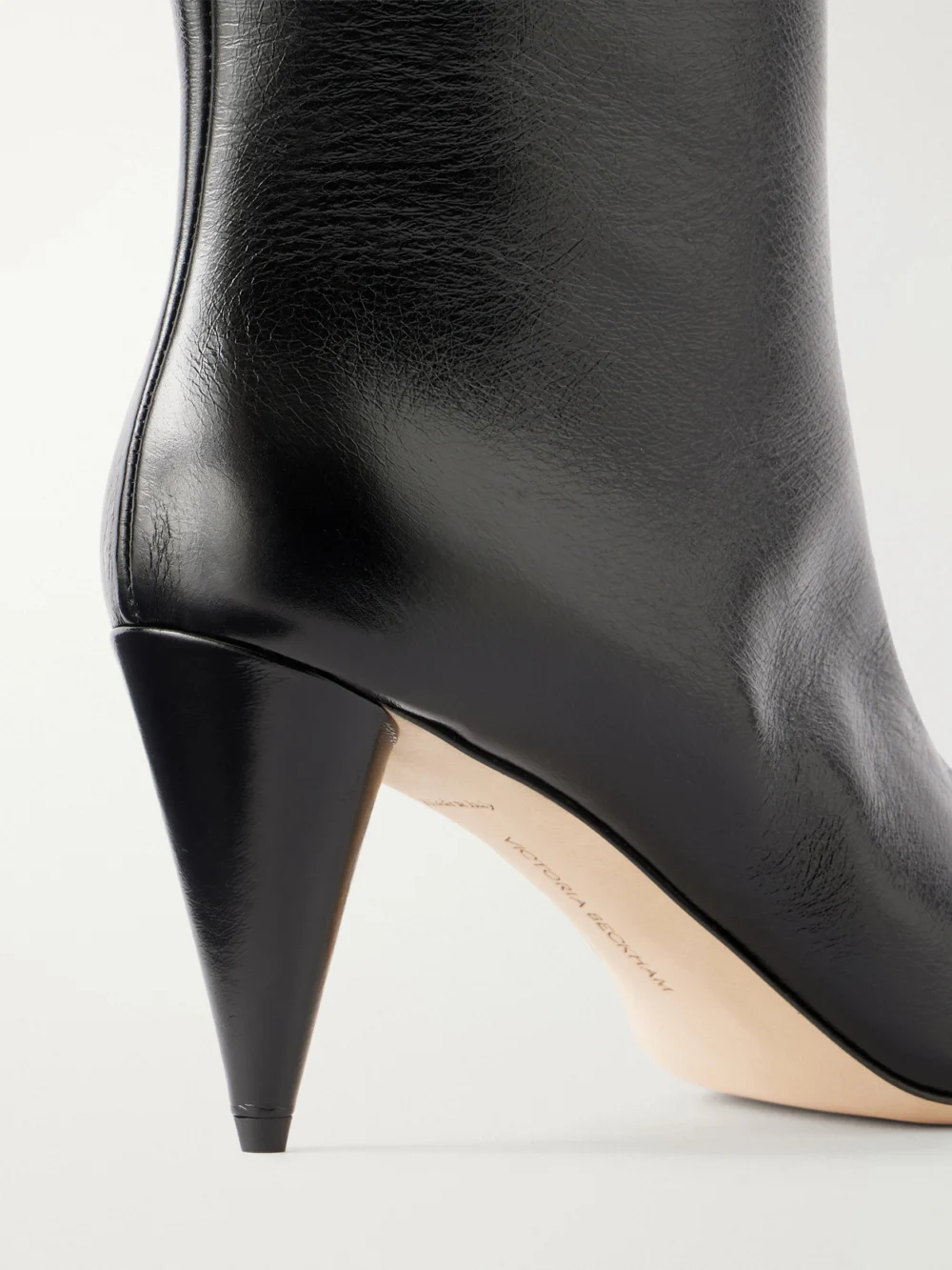 Close-up detail of the Victoria Beckham Maverick 80 Leather Knee Boots