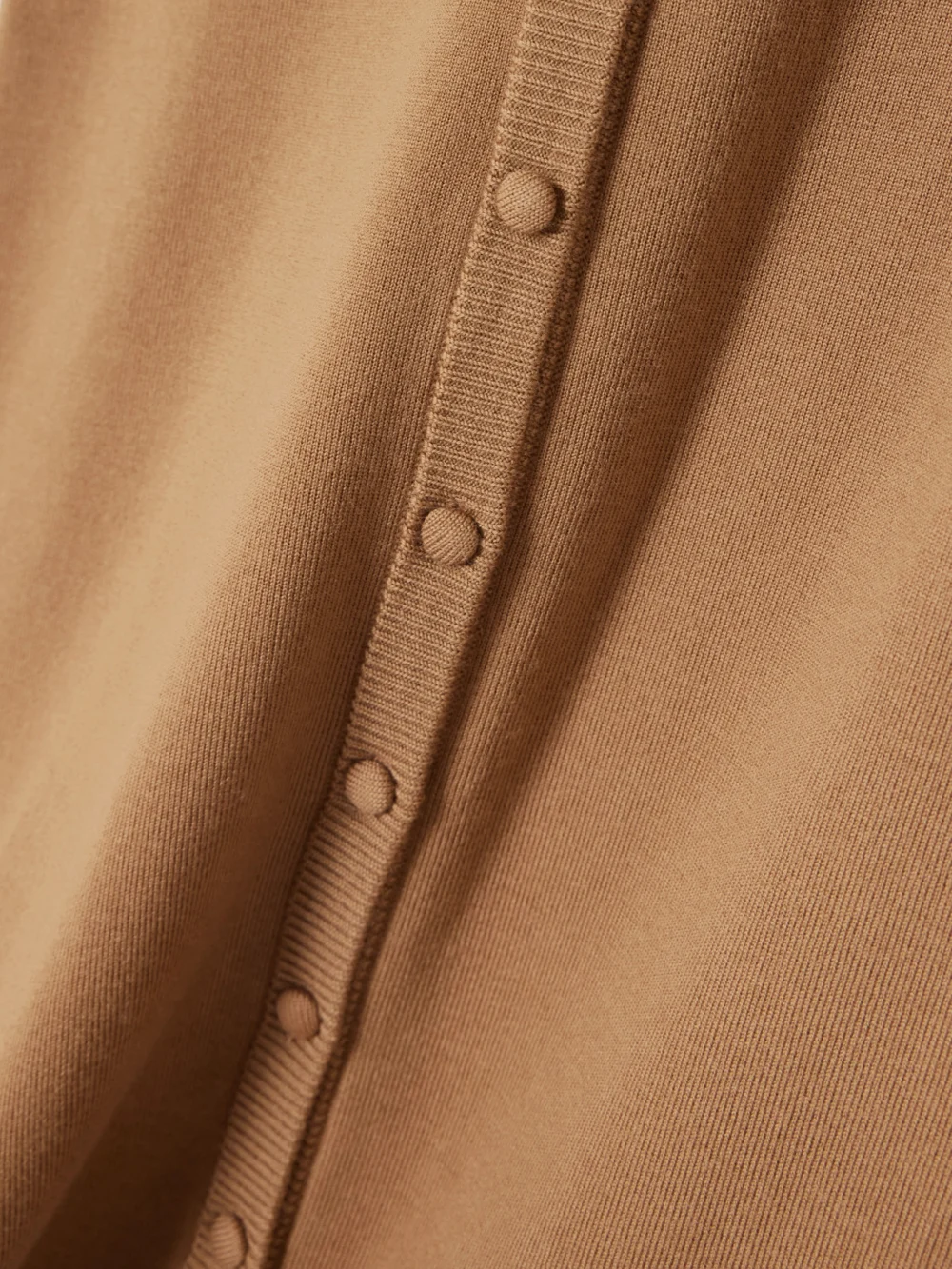 Close-up detail of the Victoria Beckham Merino Wool-blend Midi Skirt