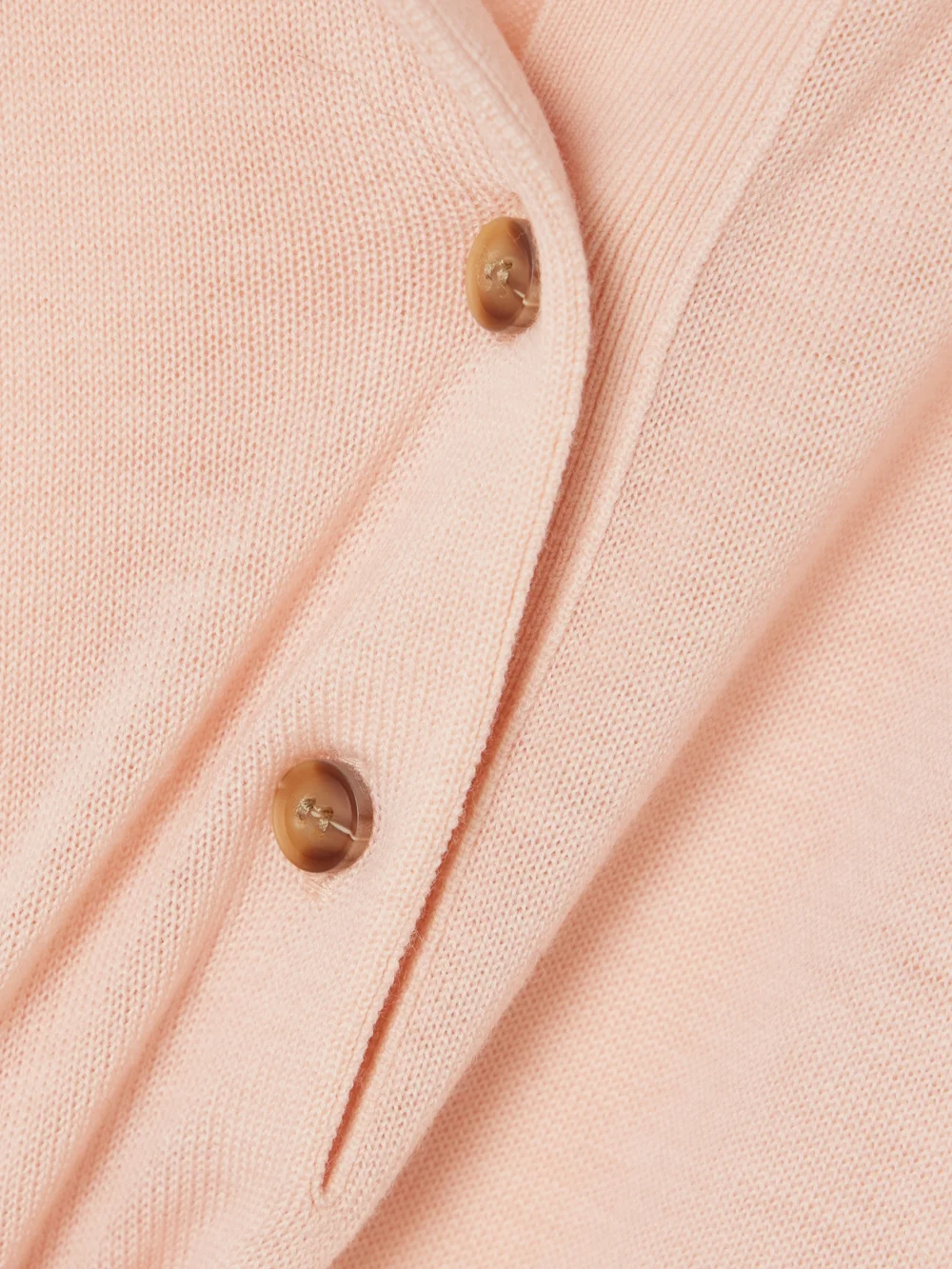Close-up detail of the Victoria Beckham Merino Wool Polo Shirt
