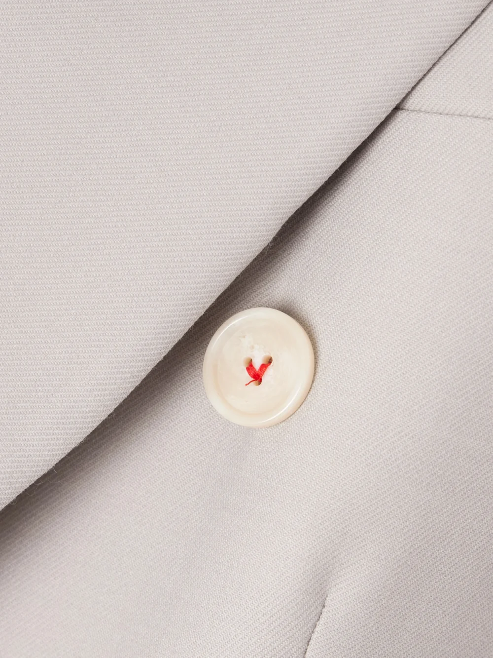 Close-up detail of the Victoria Beckham Oversized Double-breasted Twill Blazer