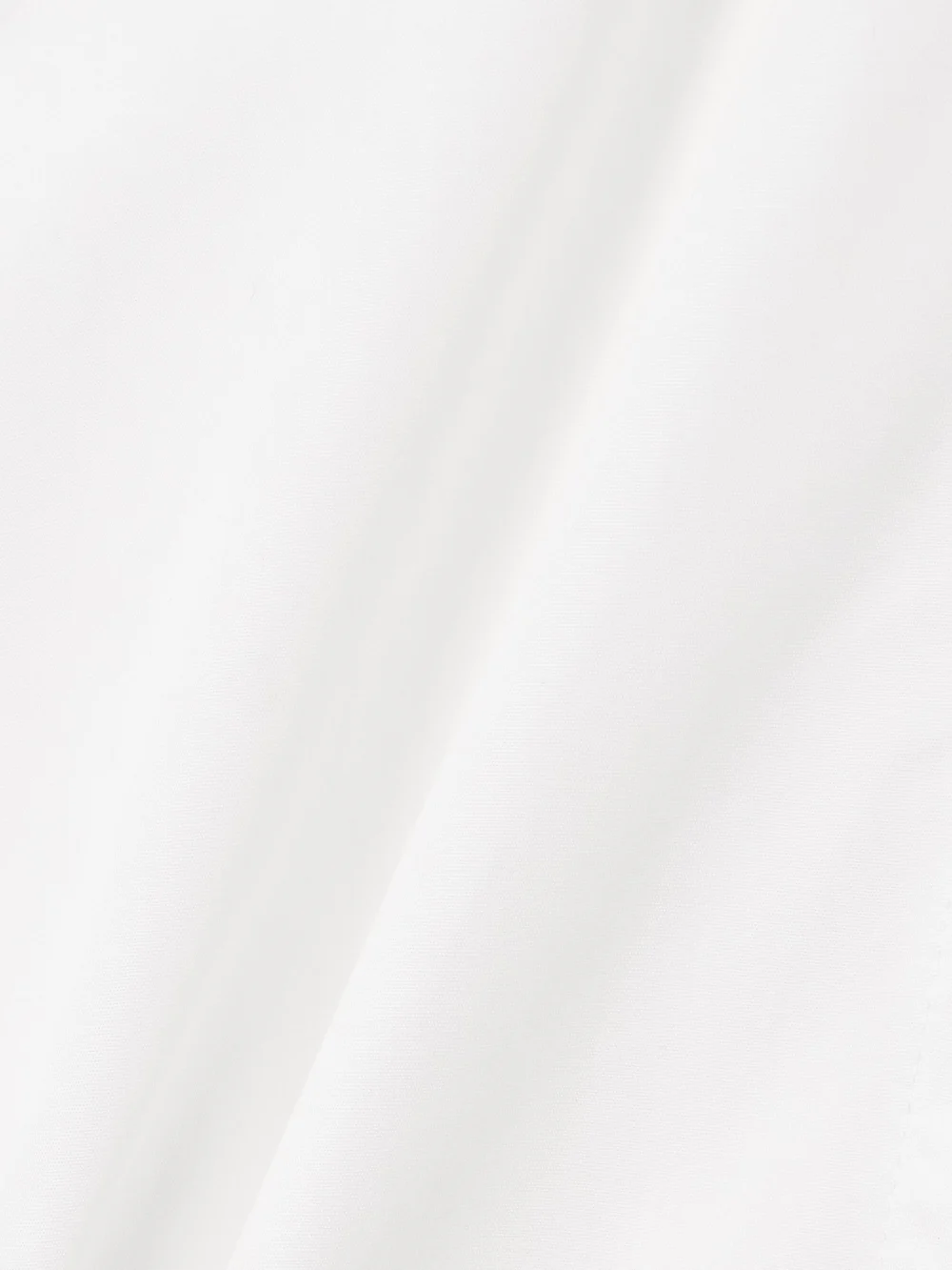 Close-up detail of the Victoria Beckham Paneled Cotton-poplin Midi Shirt Dress
