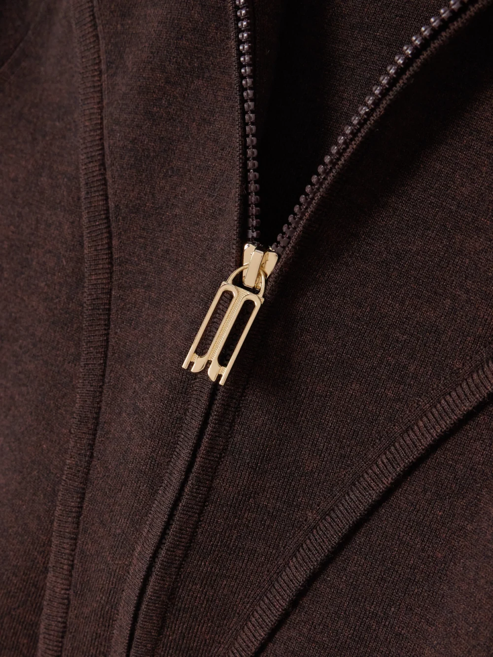Close-up detail of the Victoria Beckham Paneled Merino Wool-blend Hoodie