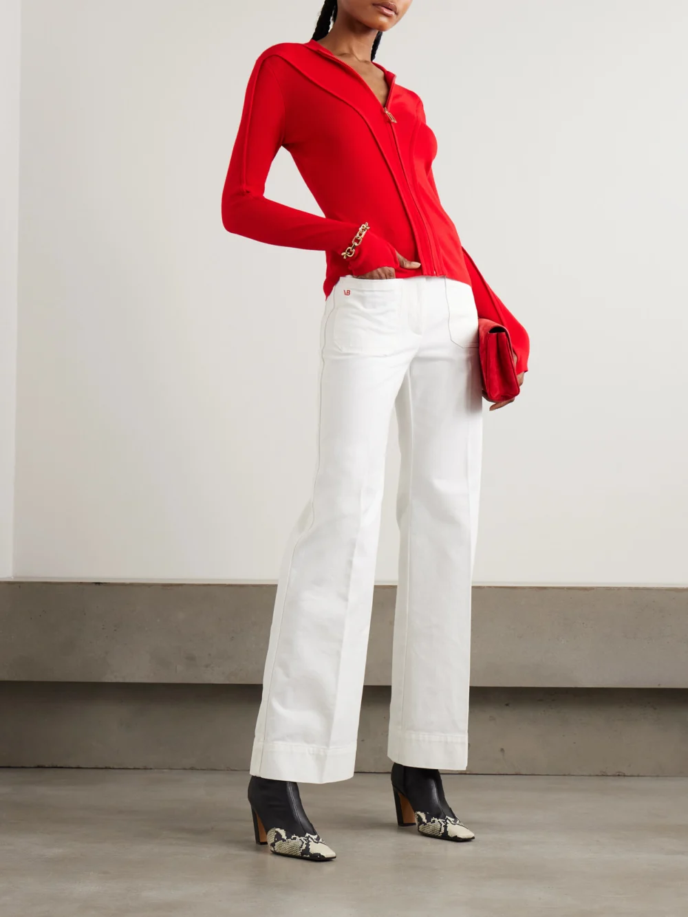 Victoria Beckham Paneled Merino Wool-blend Hoodie, worn by a model