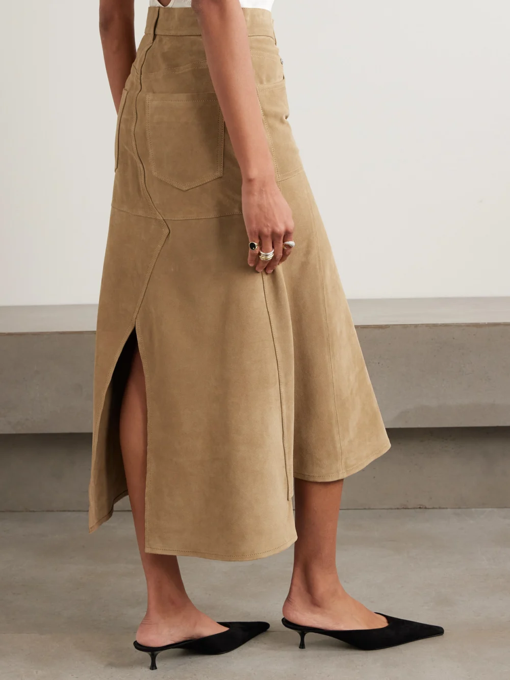 Back view of the Victoria Beckham Paneled Suede Midi Skirt