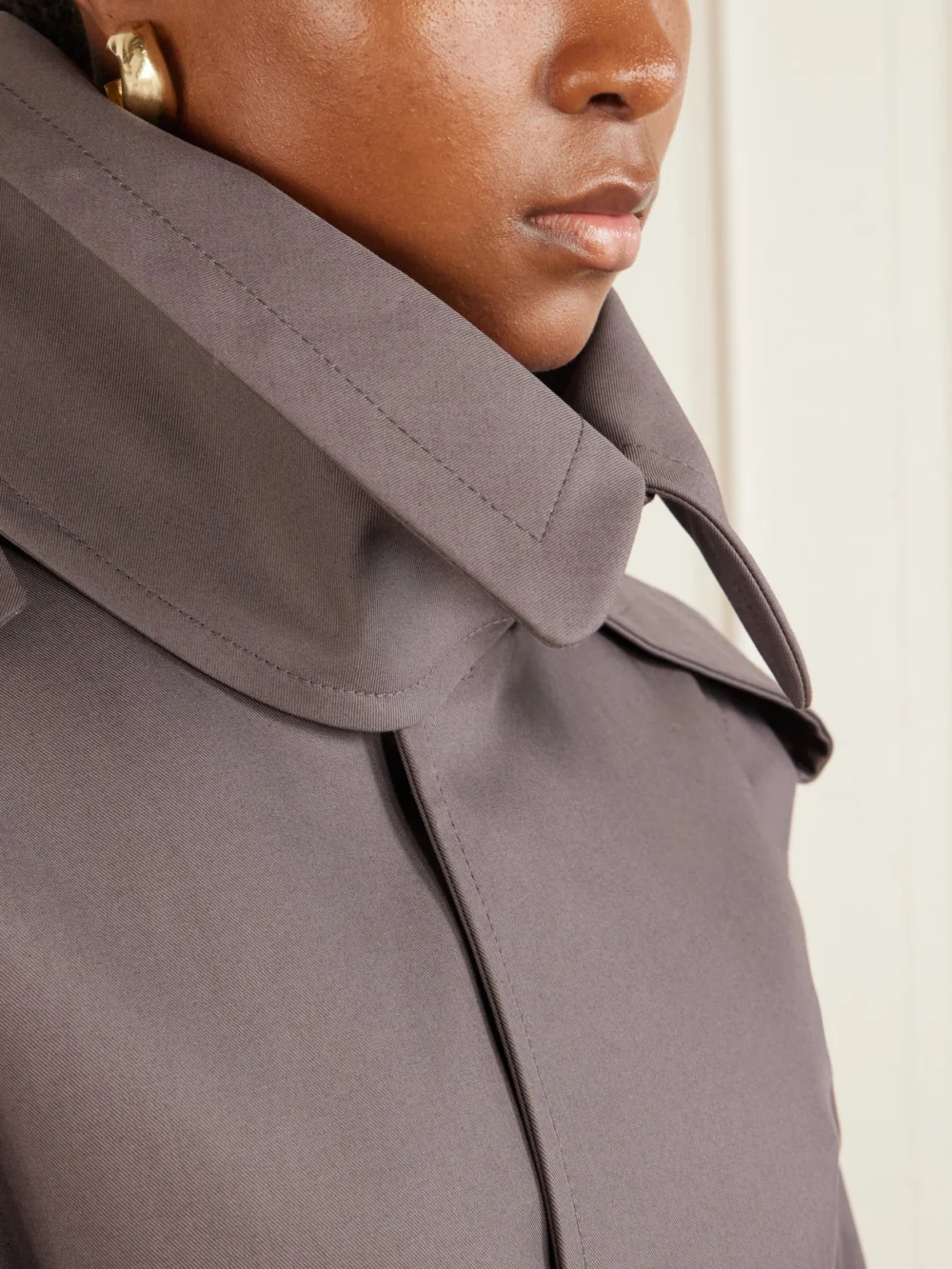 Close-up detail of the Victoria Beckham Philippa Belted Cotton Trench Coat