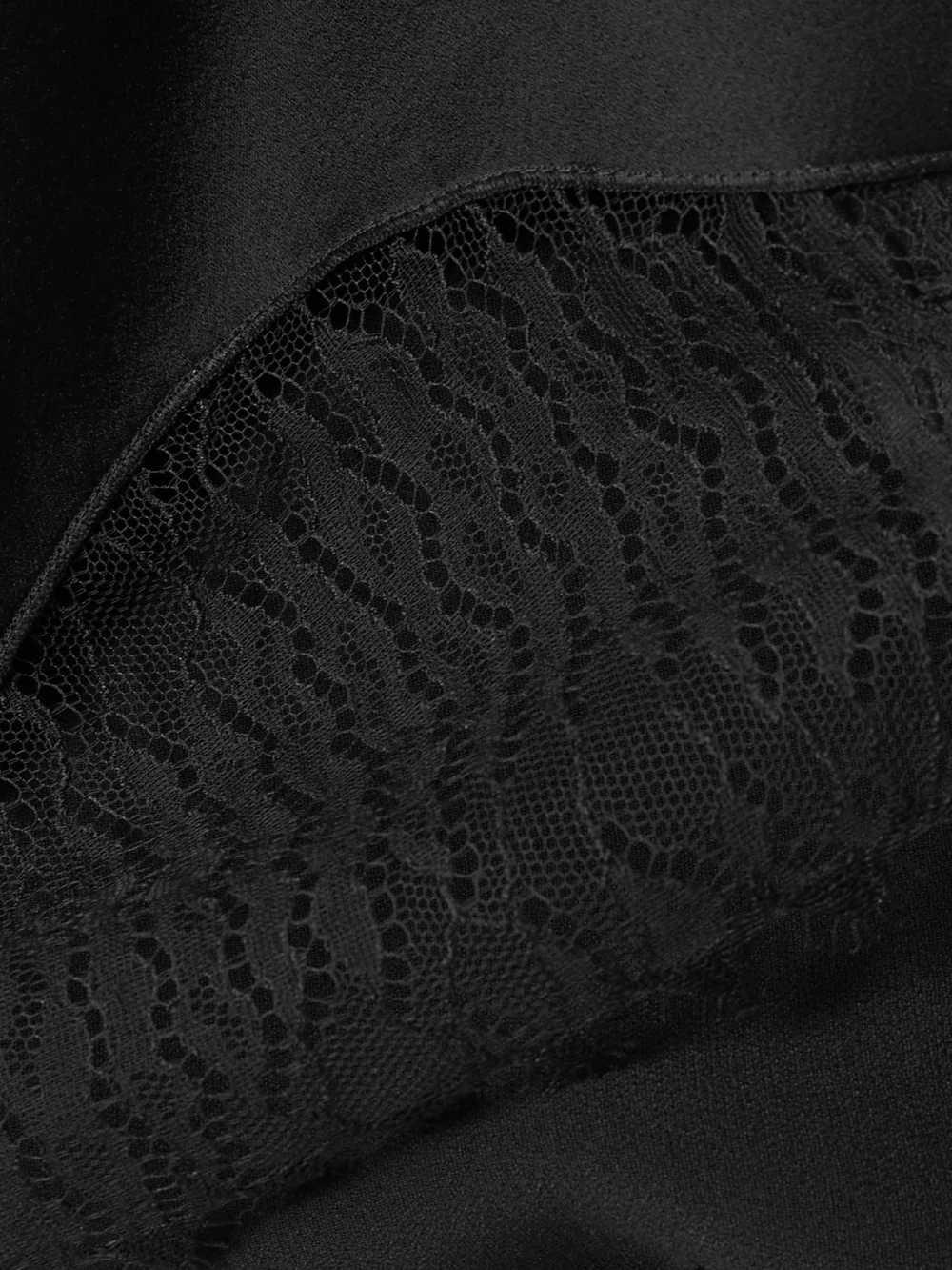 Close-up detail of the Victoria Beckham Pleated Lace and Chiffon-trimmed Satin-crepe Mini Skirt