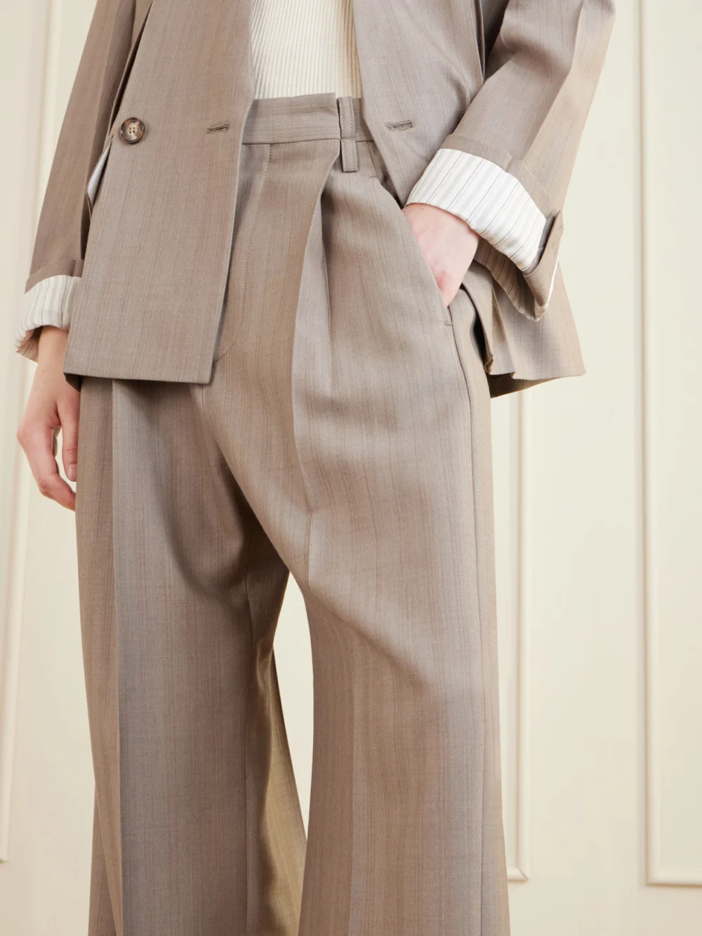 Close-up detail of the Victoria Beckham Pleated Wool Wide-leg Pants