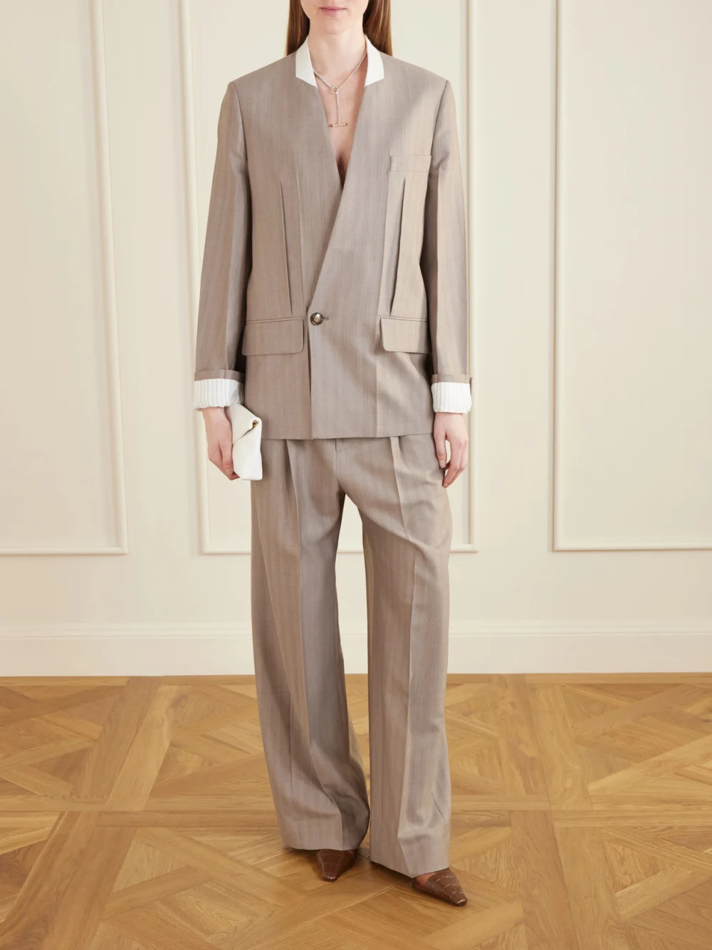 Victoria Beckham Pleated Wool Wide-leg Pants, worn by a model
