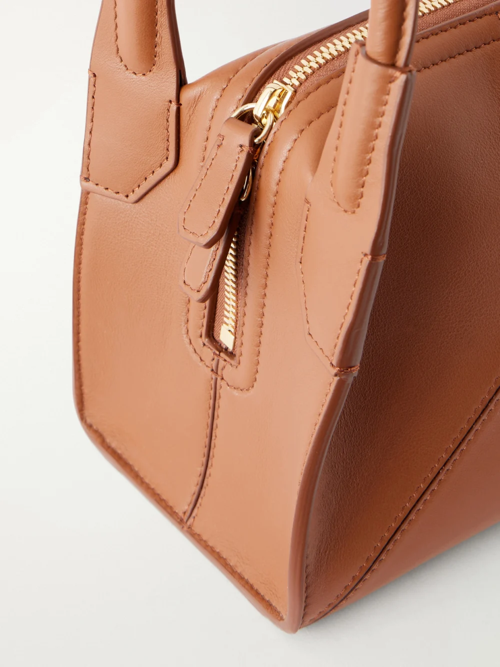 Close-up detail of the Victoria Beckham Plié Mini Leather Shoulder Bag