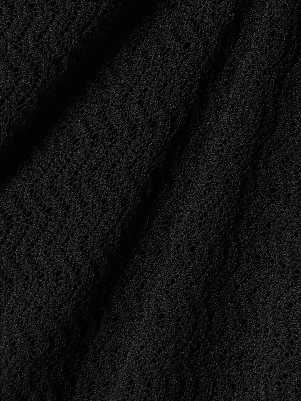 Close-up detail of the Victoria Beckham Pointelle-knit Polo Shirt