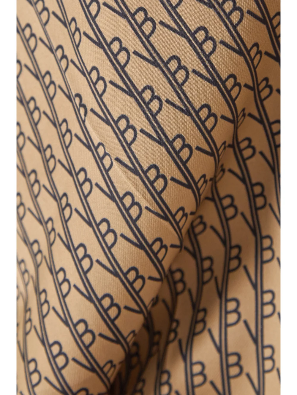 Close-up detail of the Victoria Beckham Printed Twill Straight-leg Pants