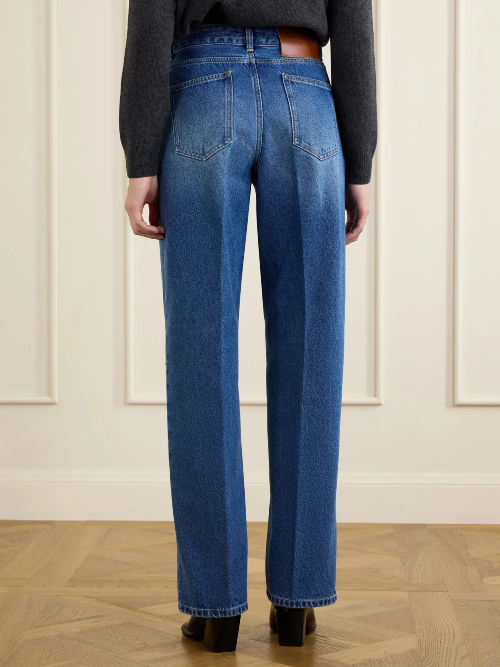 Back view of the Victoria Beckham Relaxed High-waist Wide-leg Jeans