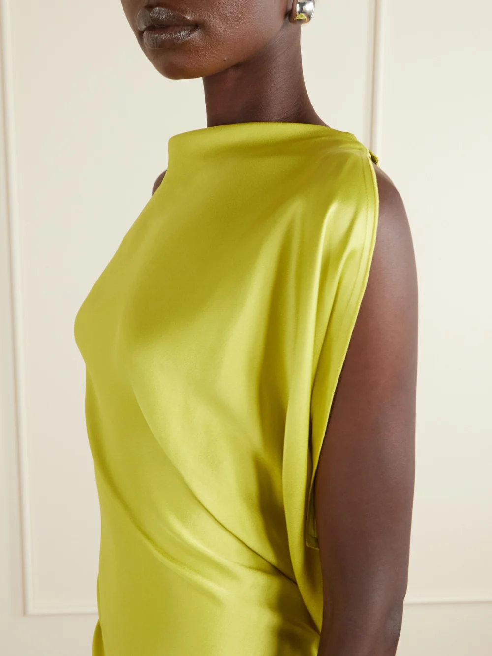 Close-up detail of the Victoria Beckham Satin Draped Gown