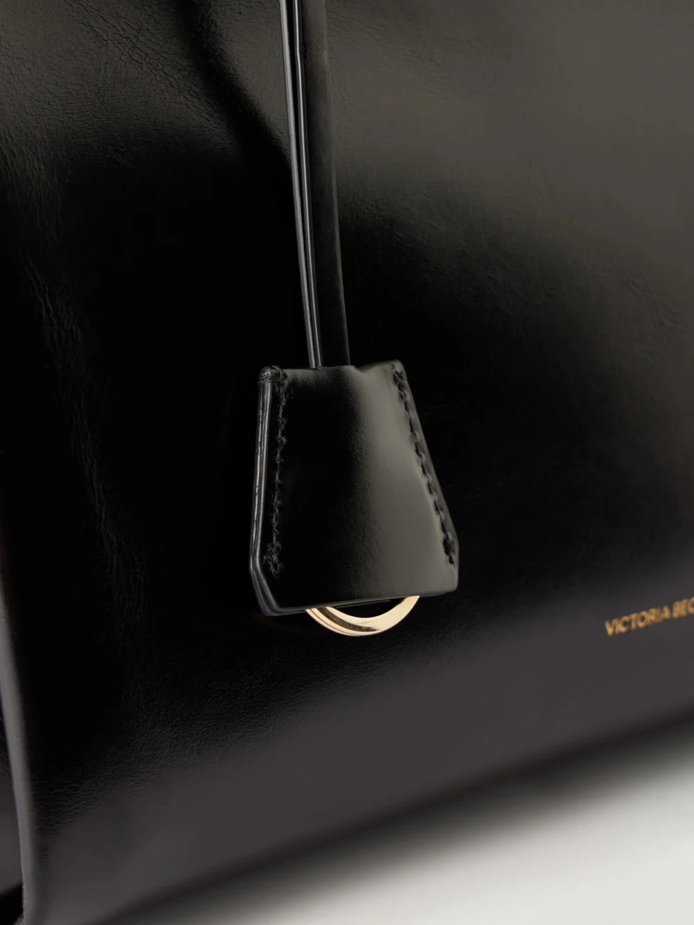 Close-up detail of the Victoria Beckham Sloane Frame Leather Tote