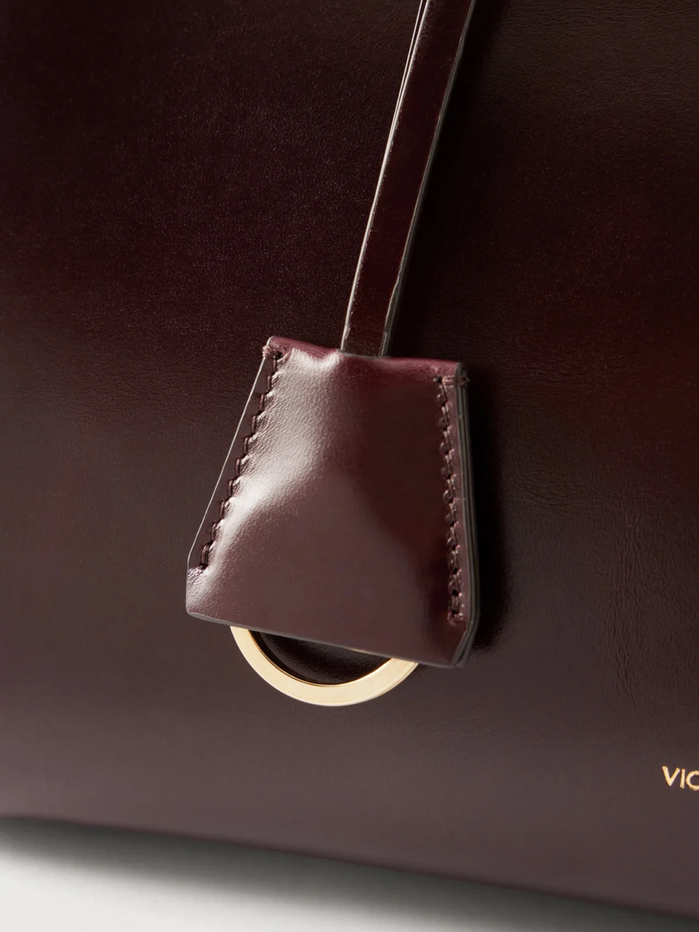 Close-up detail of the Victoria Beckham Sloane Frame Leather Tote