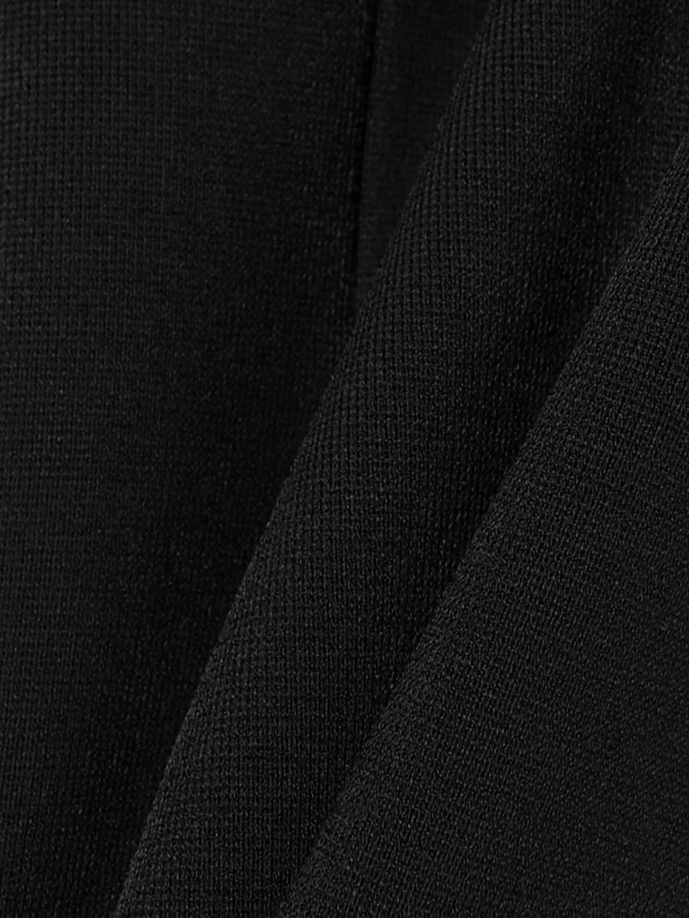 Close-up detail of the Victoria Beckham Stretch-knit Leggings