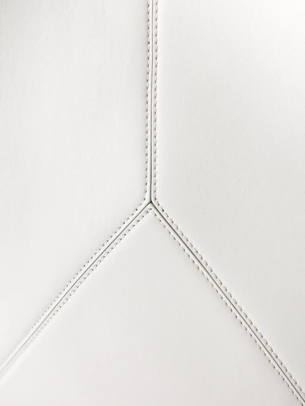 Close-up detail of the Victoria Beckham The Victoria Soft Mini Metallic Leather Tote