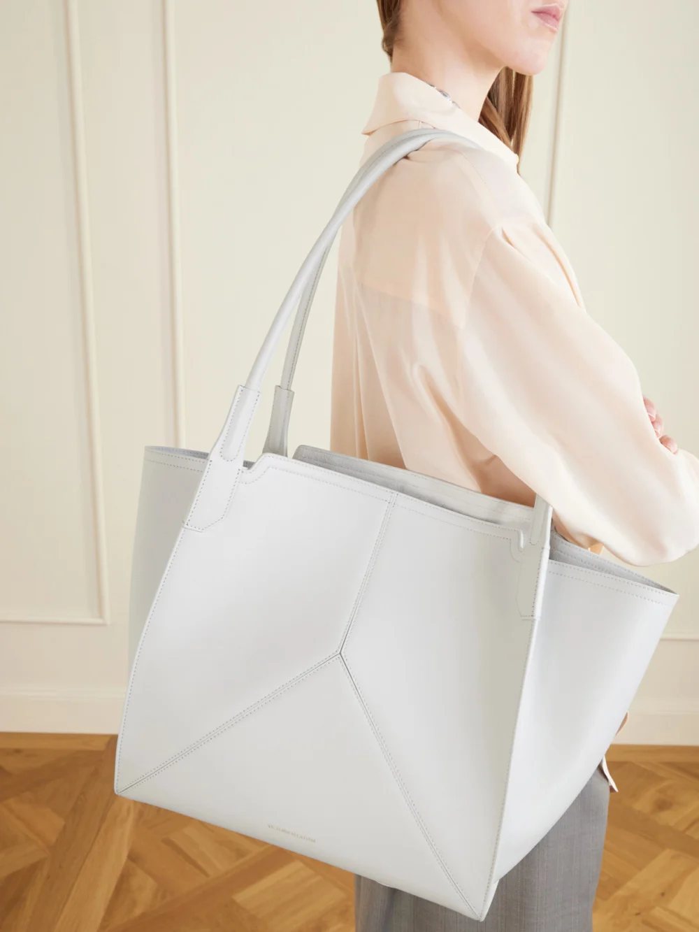 Victoria Beckham The Victoria Soft Mini Metallic Leather Tote, styled view