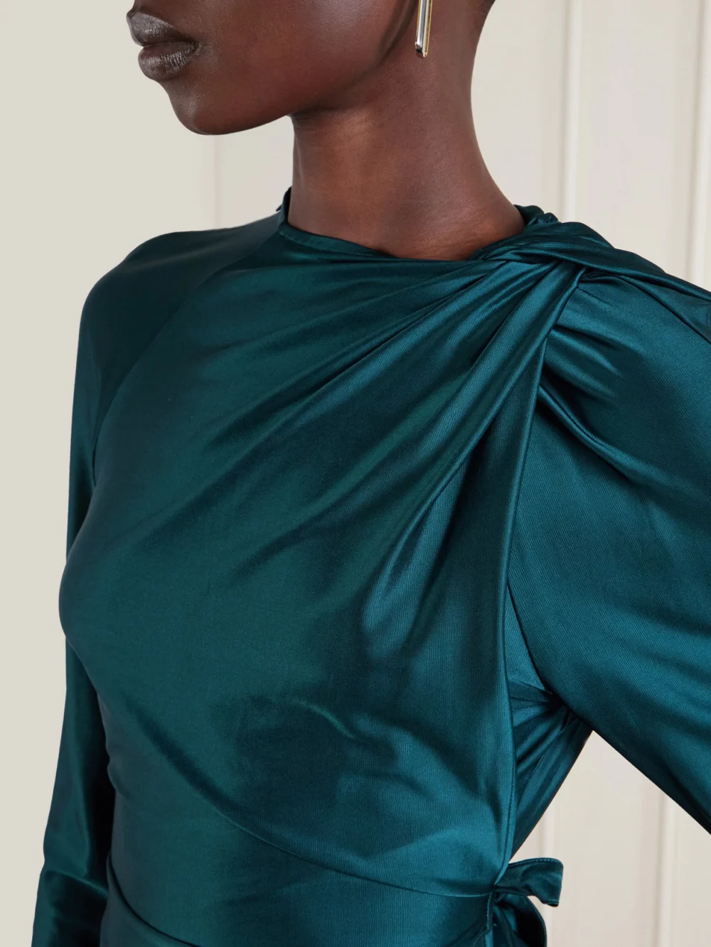 Close-up detail of the Victoria Beckham Twisted Satin Top