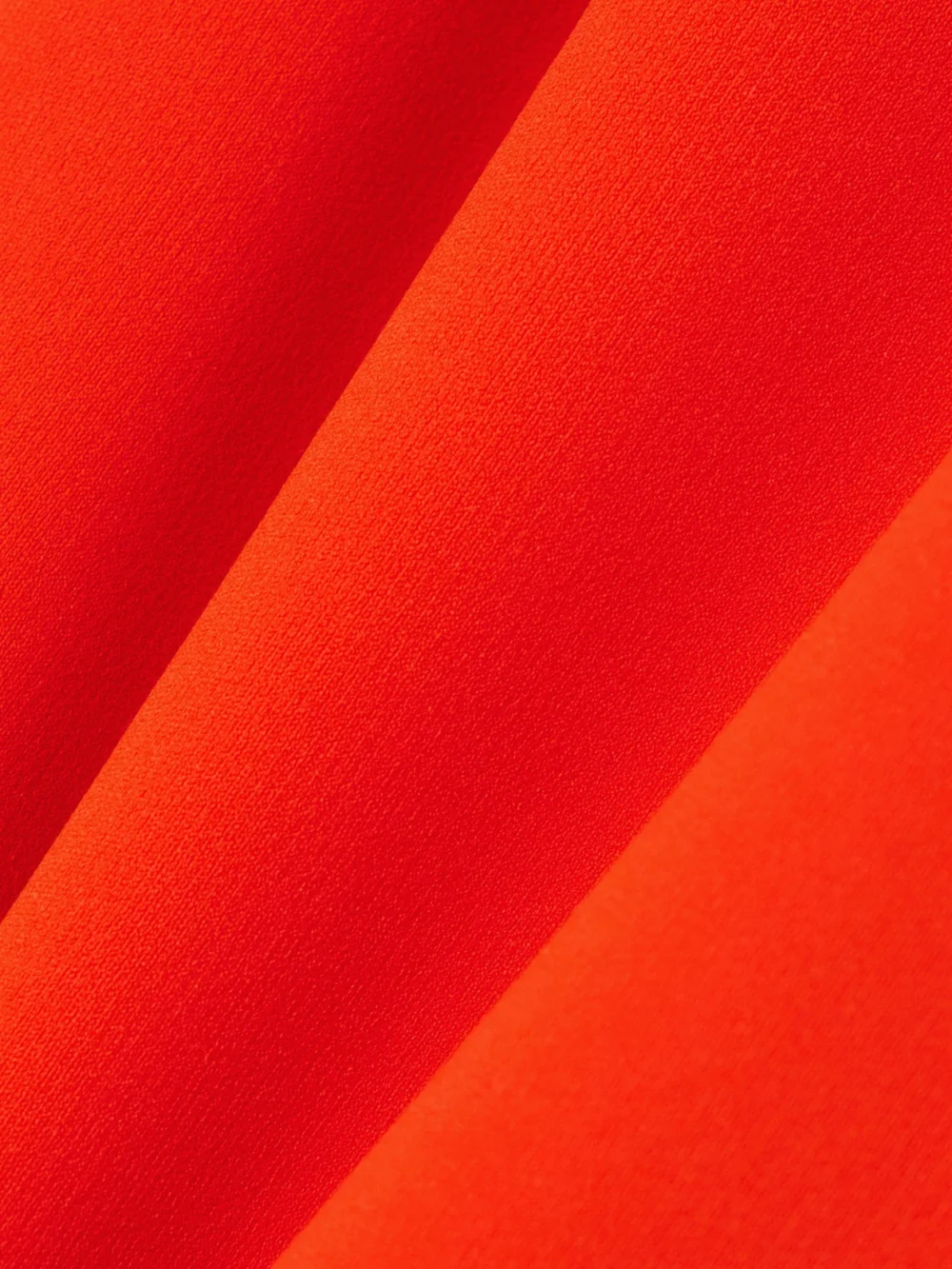 Close-up detail of the Victoria Beckham Vb Body One-sleeve Stretch-knit Midi Dress