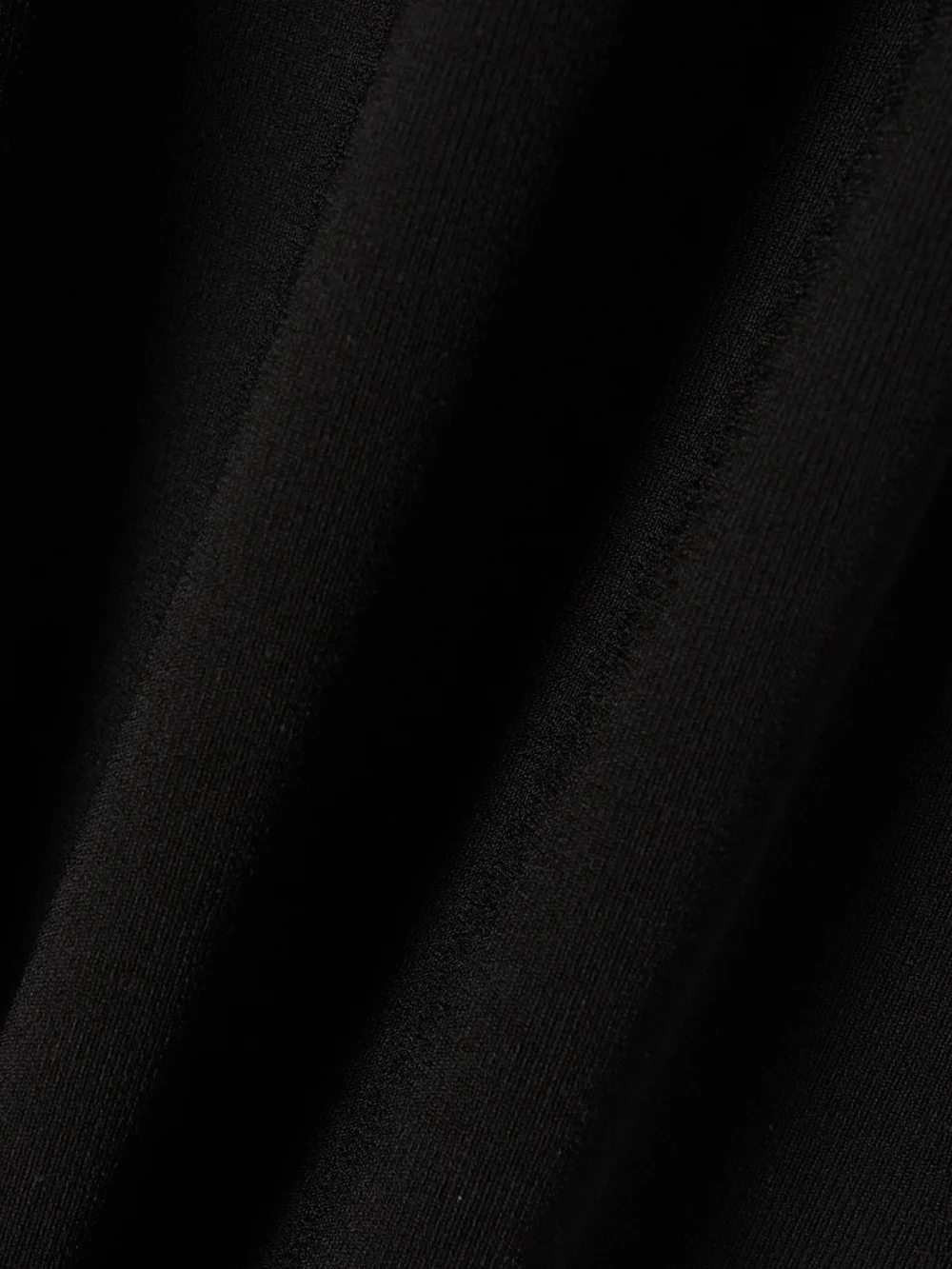 Close-up detail of the Victoria Beckham Vb Body Stretch-knit Mini Dress