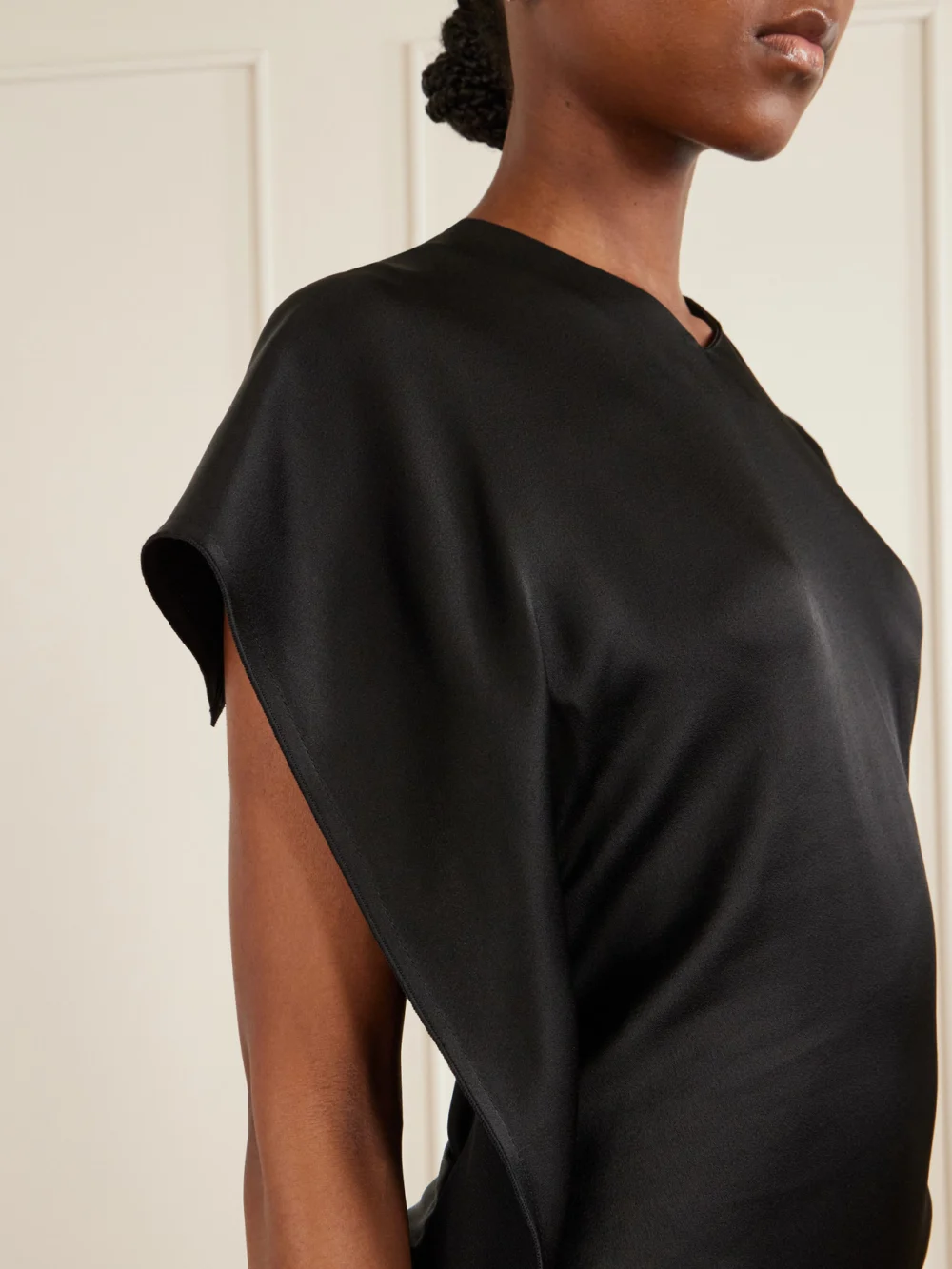 Close-up detail of the Victoria Beckham Victoria Gathered Satin Midi Dress