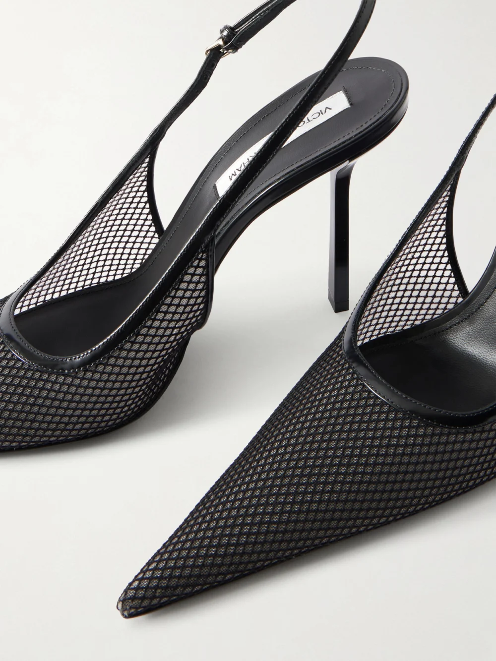 Close-up detail of the Victoria Beckham Victoria Leather-trimmed Mesh Slingback Pumps