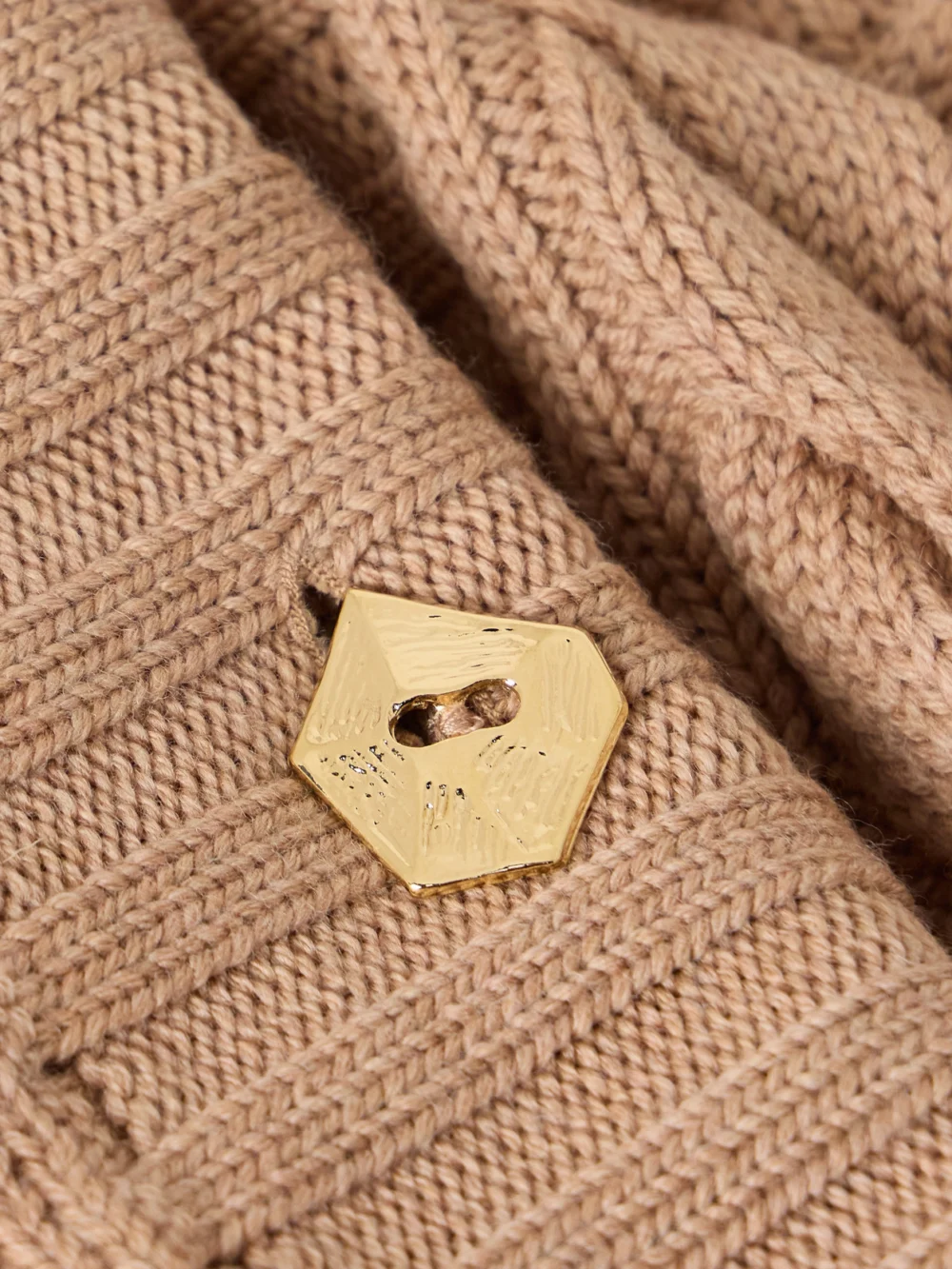 Close-up detail of the Violante Nessi Tracey Belted Cable-knit Wool Cardigan