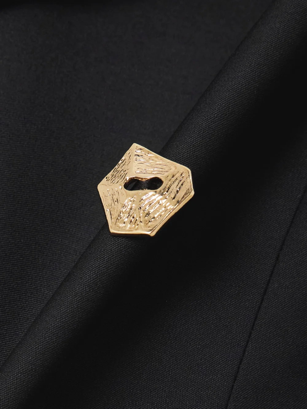 Close-up detail of the Violante Nessi Vivanti Double-breasted Off-the-shoulder Wool-cady Blouse