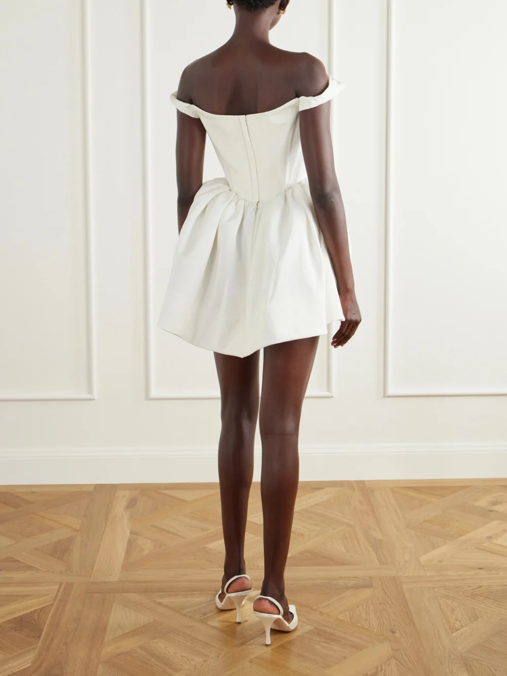 Back view of the Vivienne Westwood Bagatelle Off-the-shoulder Gathered Faille Mini Dress