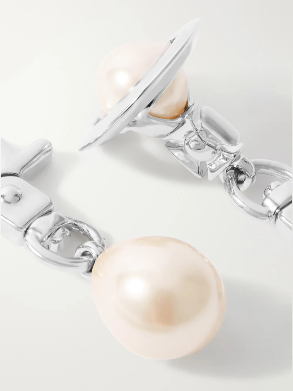 Close-up detail of the Vivienne Westwood Claude Embellished Silver-tone Earrings