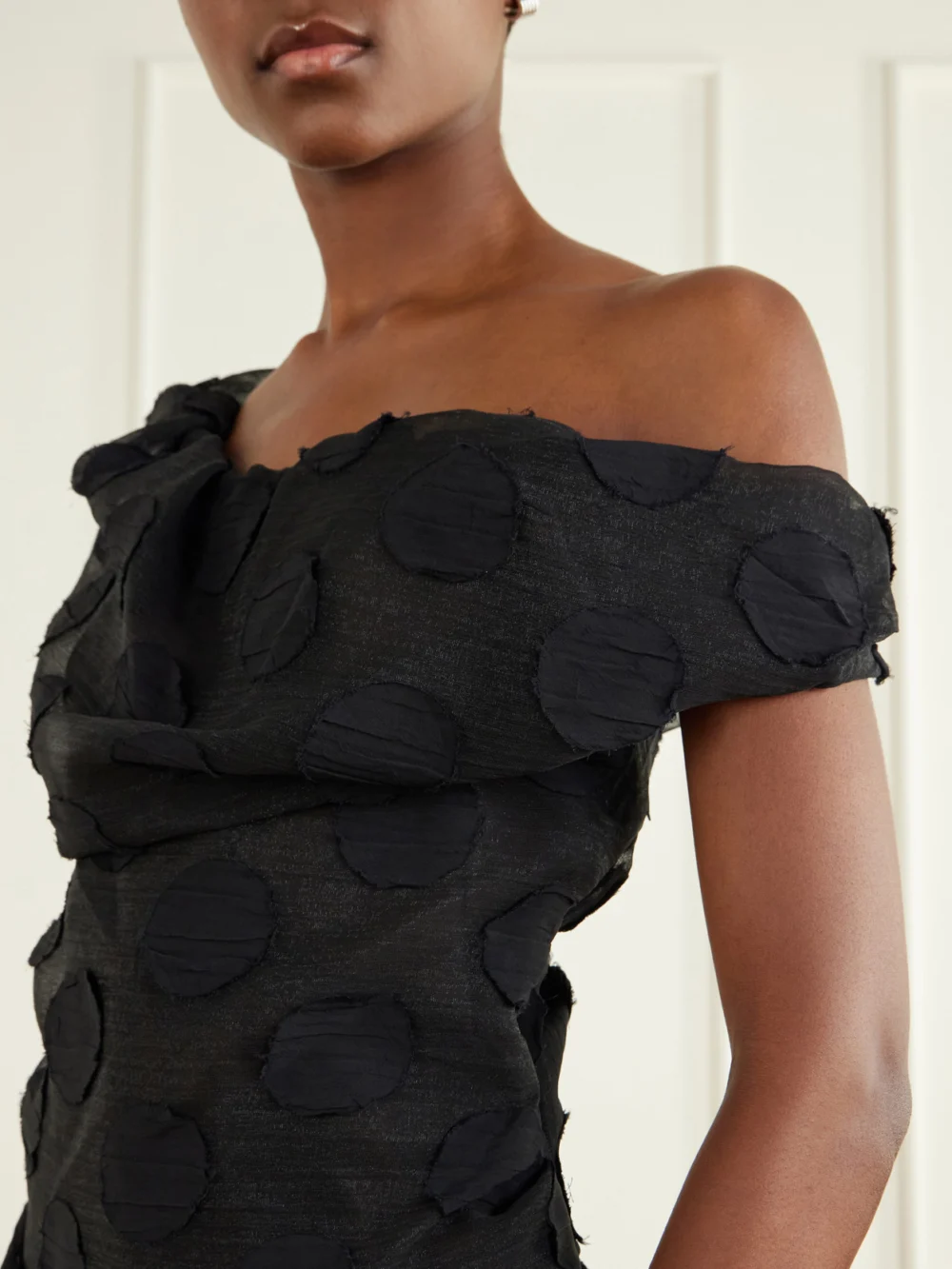 Close-up detail of the Vivienne Westwood Flocked Chiffon Polka-dot Midi Dress