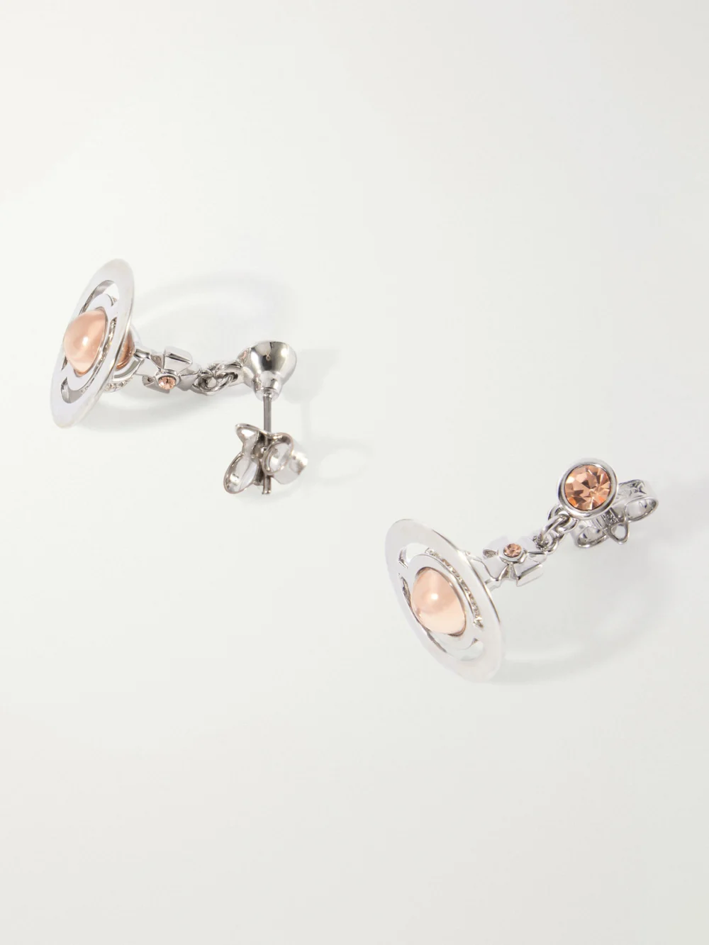 Close-up detail of the Vivienne Westwood New Petite Orb Silver-tone Cubic Zirconia Earrings