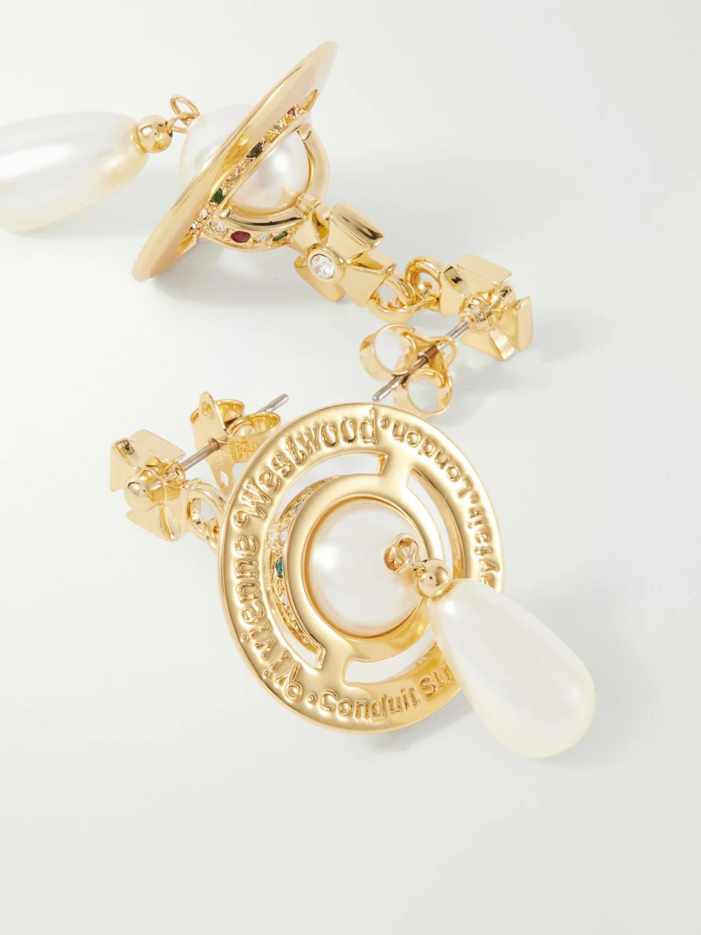 Close-up detail of the Vivienne Westwood Pearl Drop Crystal-embellished Gold-tone Earrings