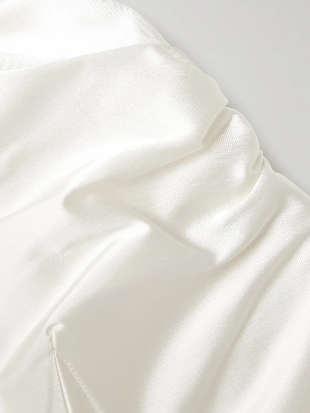 Close-up detail of the Vivienne Westwood Raven Strapless Gathered Satin Bustier Top