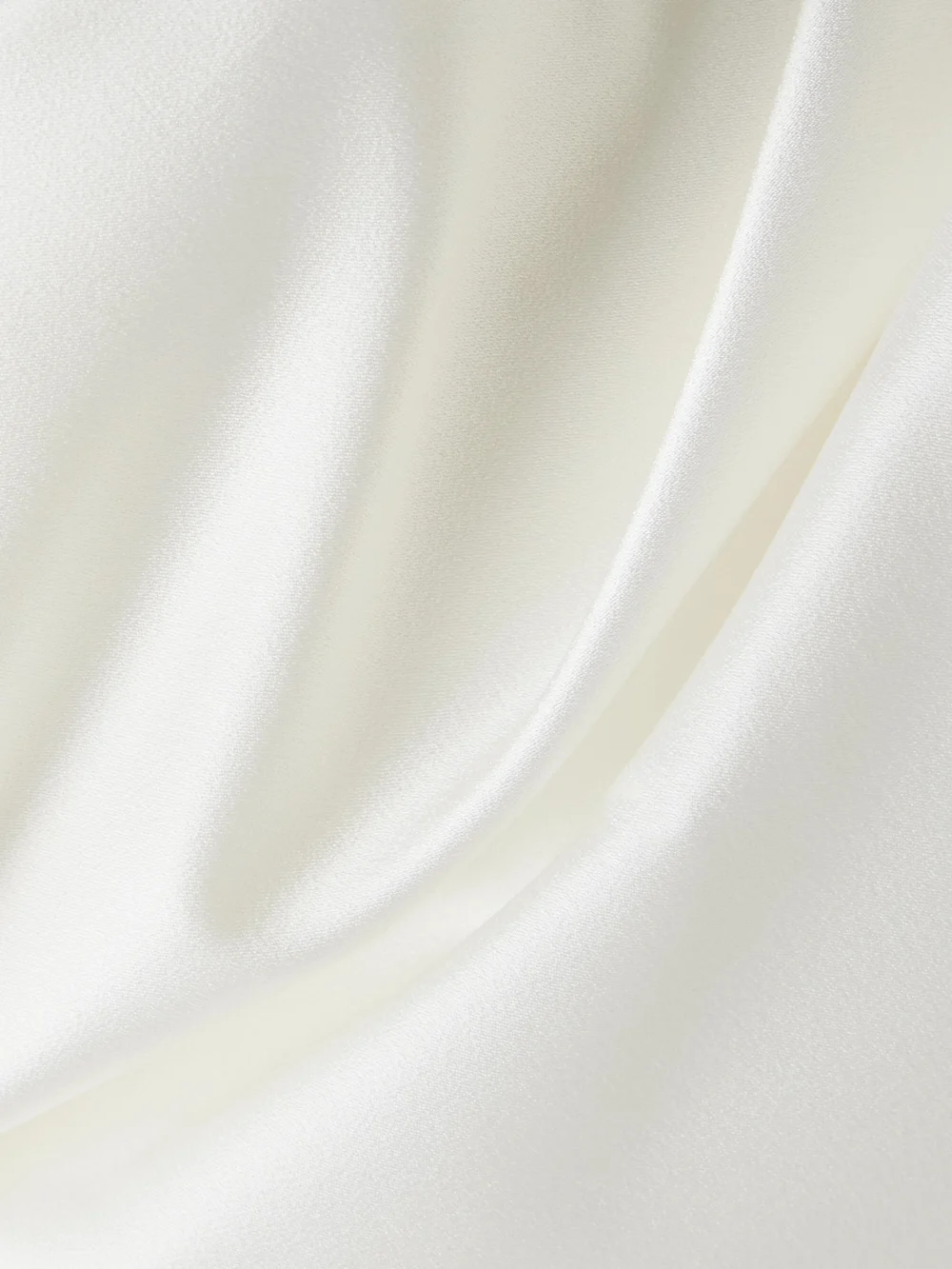Close-up detail of the Vivienne Westwood Sybyl Off-the-shoulder Draped Satin Gown