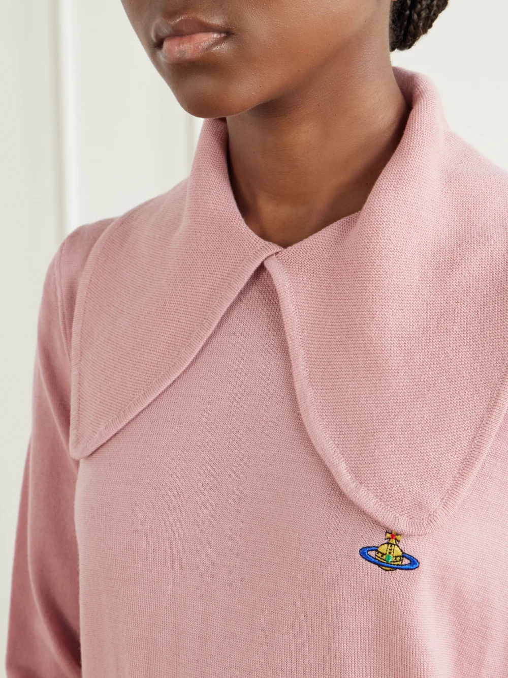 Close-up detail of the Vivienne Westwood Tie Bea Logo-embroidered Wool Polo Sweater