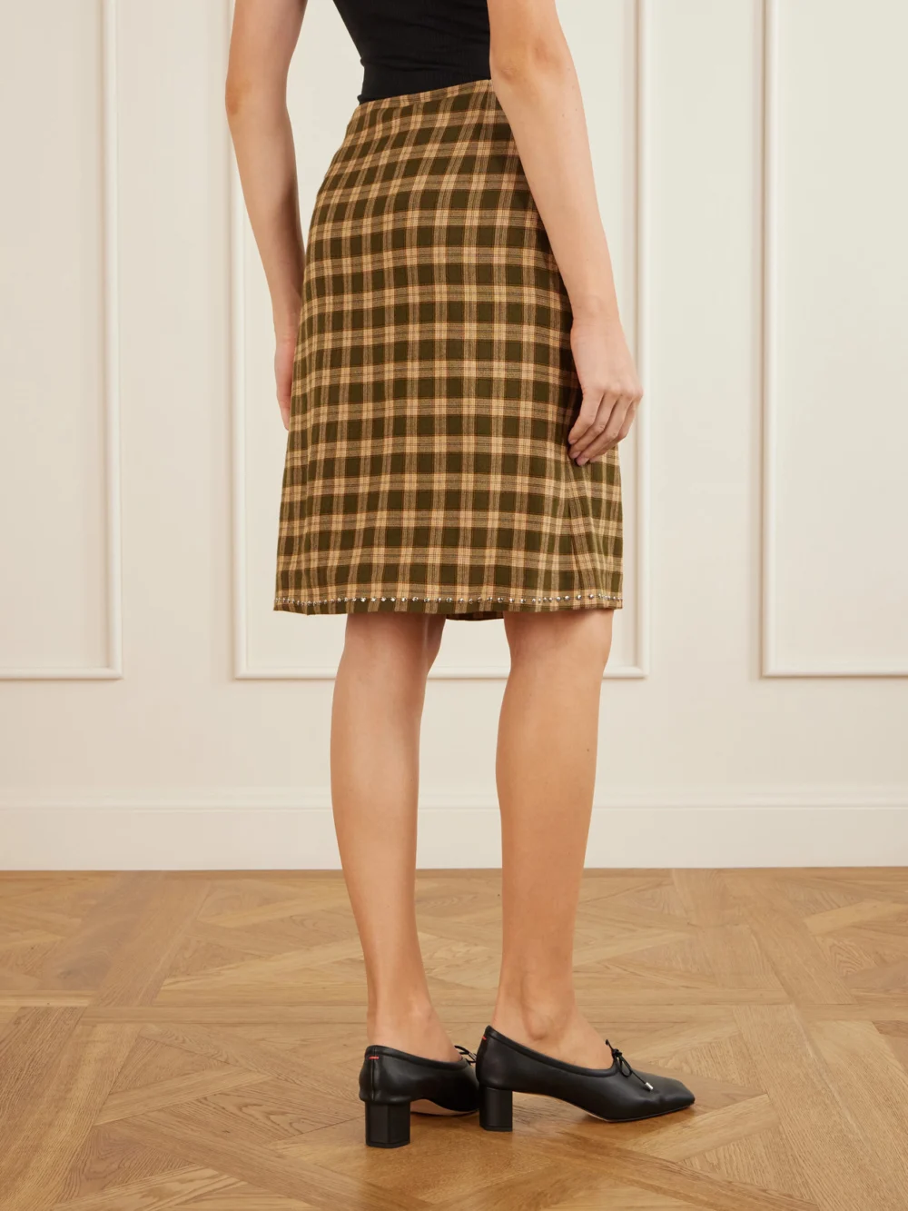 Back view of the Wales Bonner Cosmic Frayed Studded Checked Flannel Mini Skirt