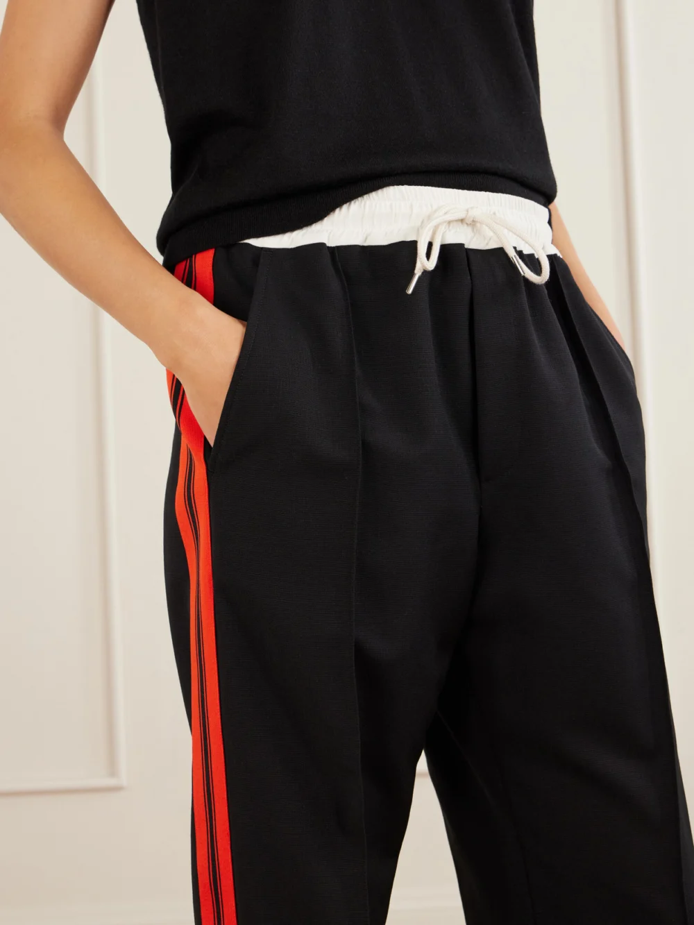 Close-up detail of the Wales Bonner Energy Striped Wool Track Pants