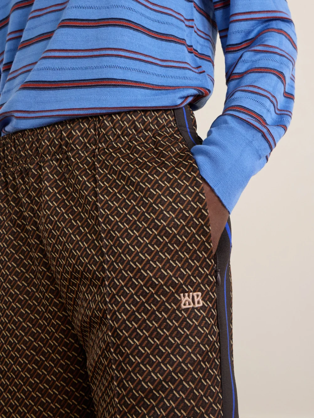 Close-up detail of the Wales Bonner Mudra Jacquard-woven Jersey Mid-rise Straight-leg Track Pants