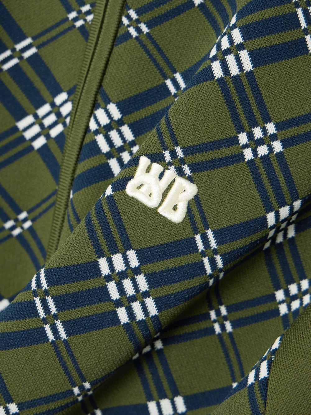 Close-up detail of the Wales Bonner Power Embroidered Stripes Jacquard-knit Track Jacket