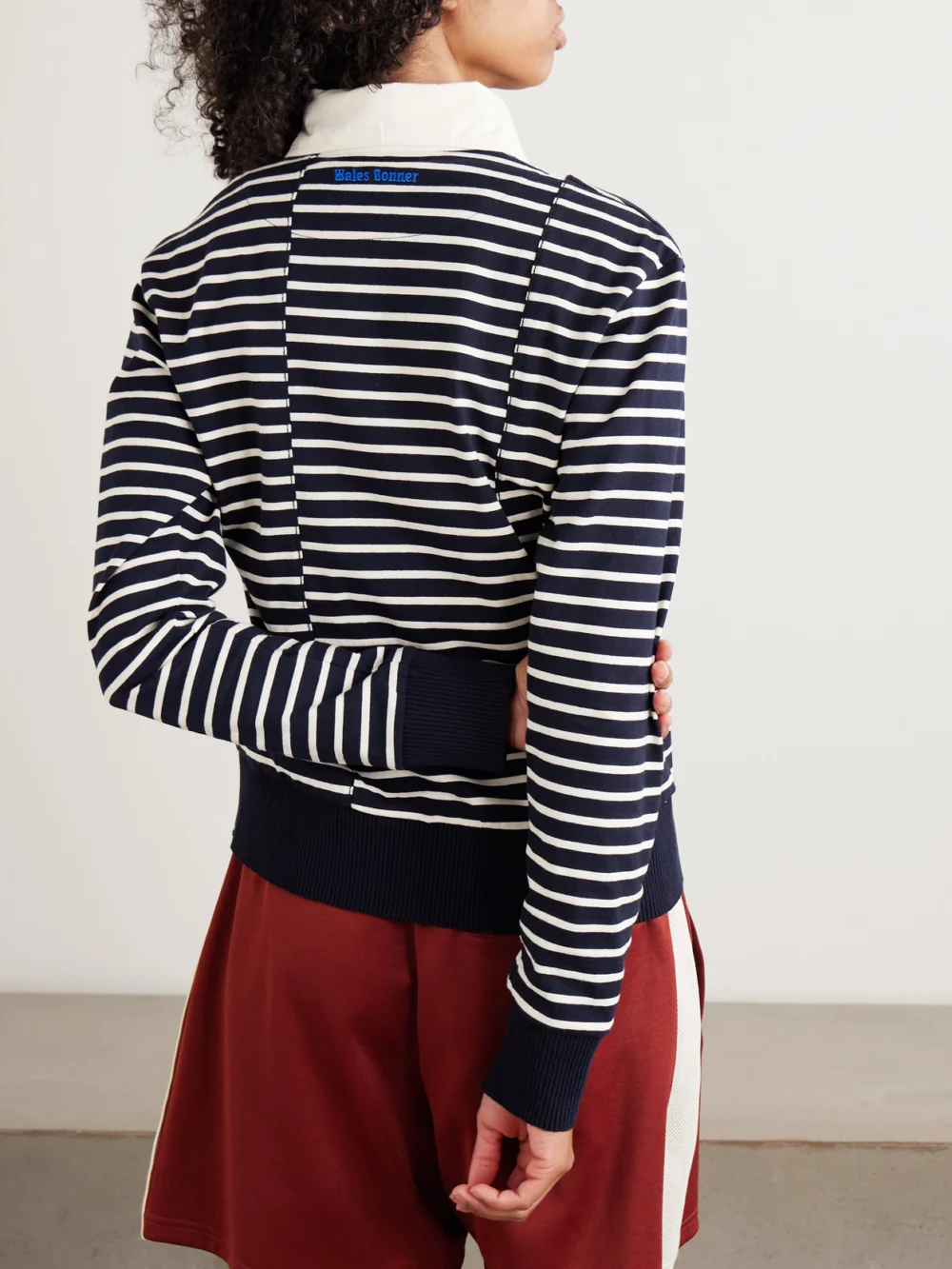 Back view of the Wales Bonner Reflect Embroidered Stretch Cotton Poplin-trimmed Striped Cotton-jersey Polo Shirt