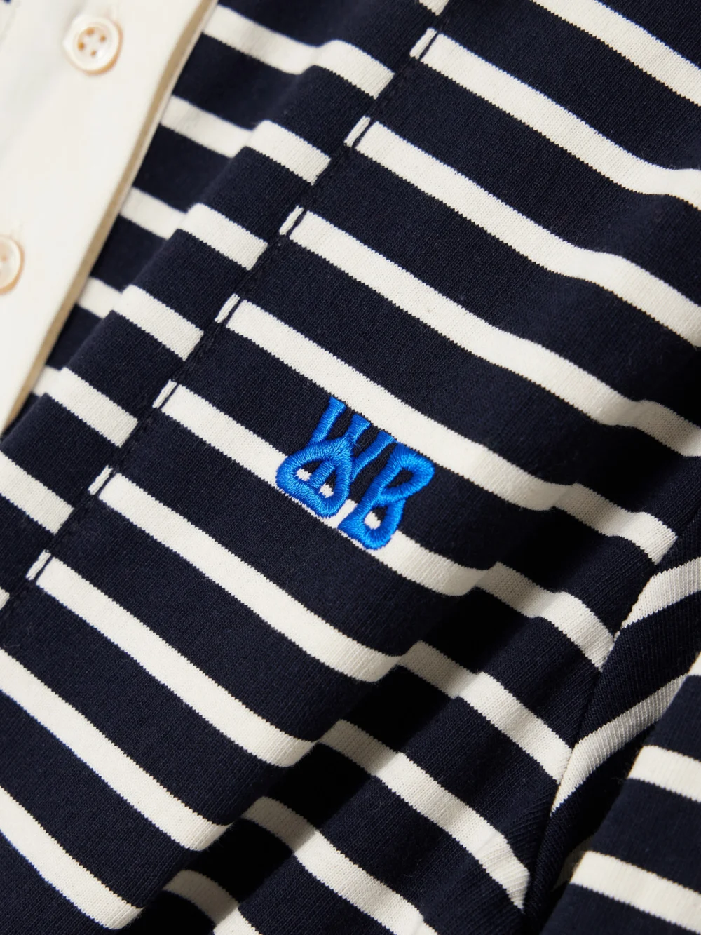 Close-up detail of the Wales Bonner Reflect Embroidered Stretch Cotton Poplin-trimmed Striped Cotton-jersey Polo Shirt