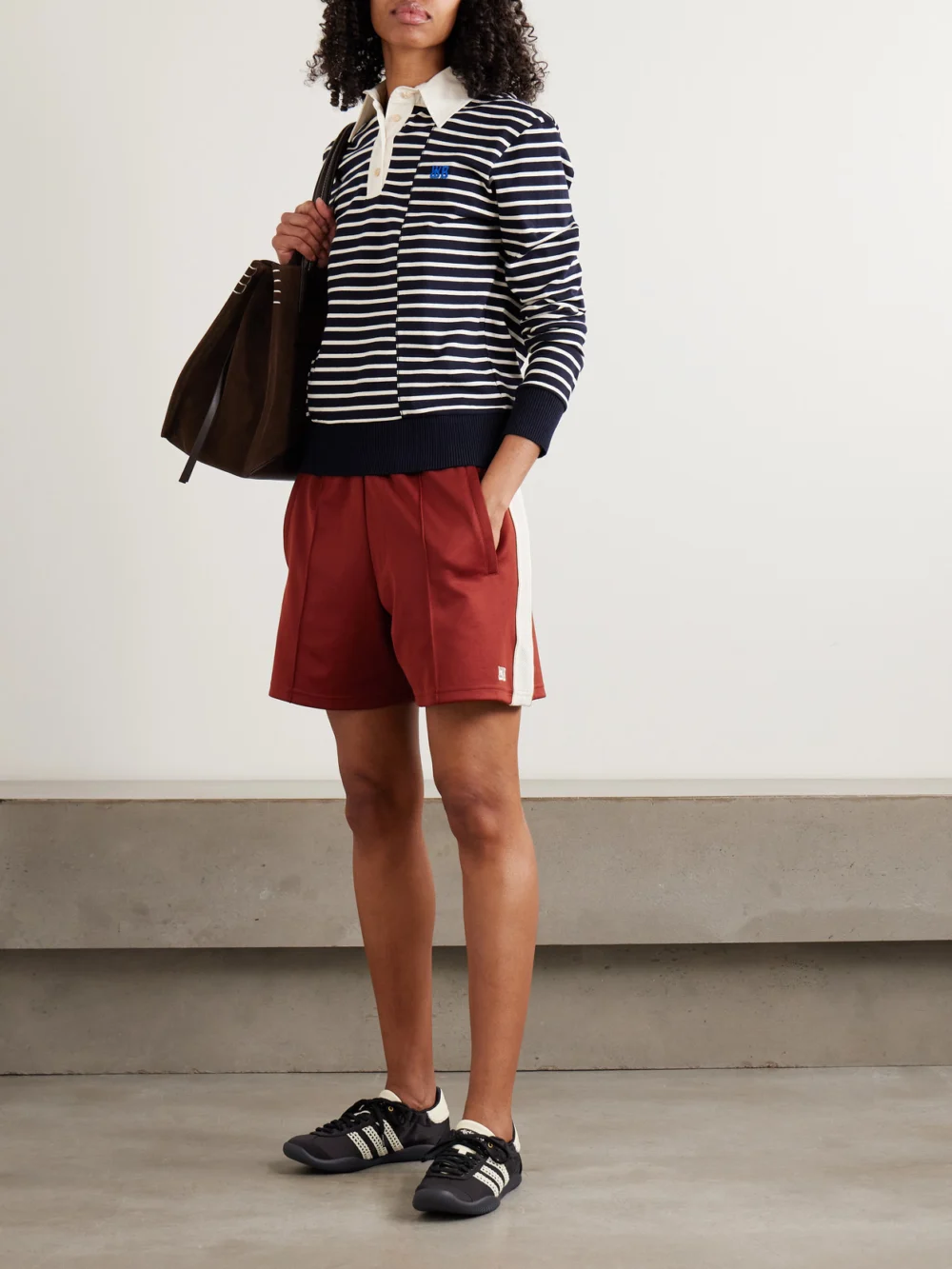Wales Bonner Reflect Embroidered Stretch Cotton Poplin-trimmed Striped Cotton-jersey Polo Shirt, worn by a model