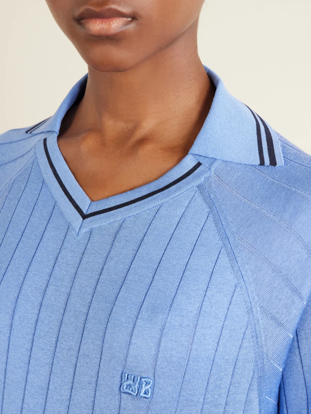Close-up detail of the Wales Bonner Roots Logo-embroidered Striped Polo Shirt
